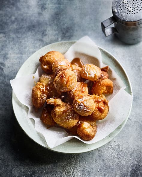 pineapple-fritters-with-salted-caramel-sauce image