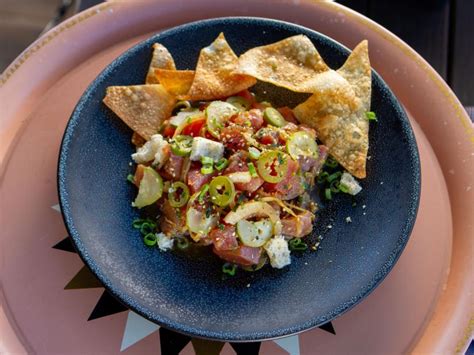 spicy-tuna-poke-with-wonton-chips-recipe-food-network image