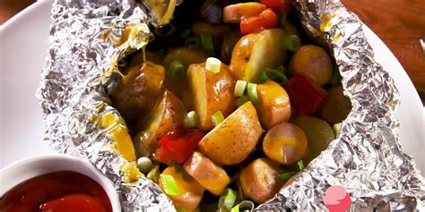campfire-hot-dogs-cheesy-potatoes-foil-packets image