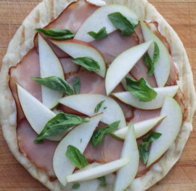 grilled-pizzettas-with-pears-shaved-ham-and image