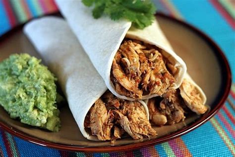 slow-cooker-shredded-chicken-burritos-the-cooking image