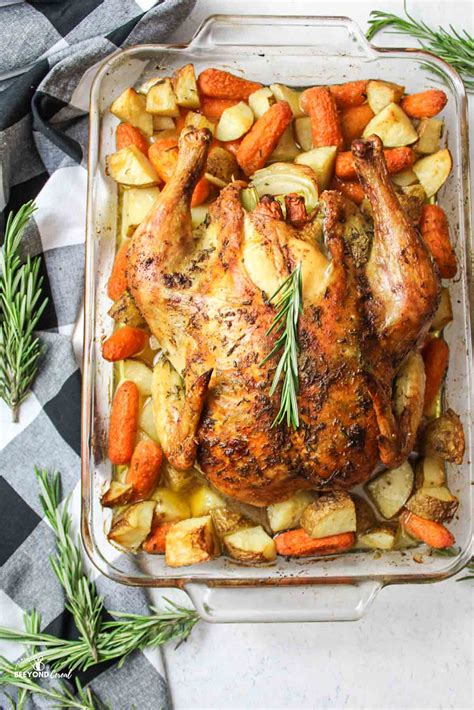 roasted-whole-chicken-with-potatoes-and-carrots image