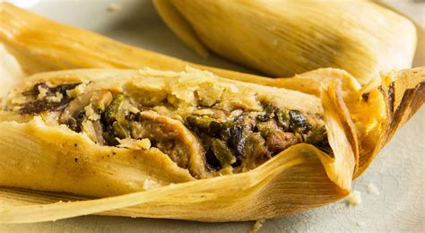 broken-spanishs-mushroom-and-poblano-tamales image