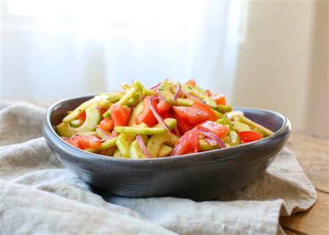 cucumber-salad-with-spicy-tomato-vinaigrette image