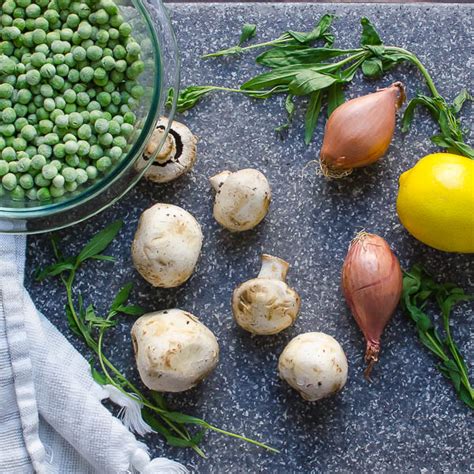 peas-with-shallots-mushrooms-and-tarragon-garlic image