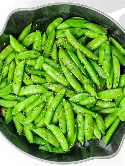 stir-fried-sugar-snap-peas-with-garlic-and-sesame image