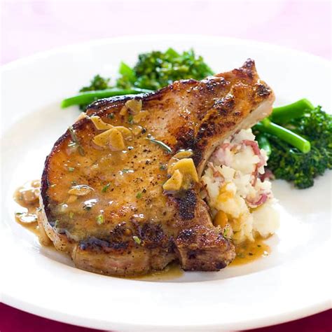 garlic-rosemary-pork-chops-cooks-country image