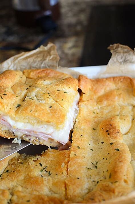 easy-hot-ham-and-cheese-sandwiches-the-salty-pot image