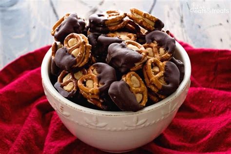 chocolate-dipped-peanut-butter-pretzels-julies-eats image