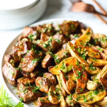 garlic-butter-steak-bites-and-fries-damn-delicious image