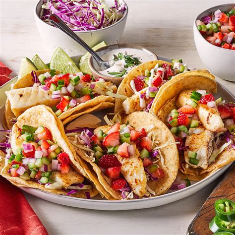 fish-tacos-with-strawberry-cucumber-salsa image