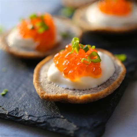 buckwheat-blinis-with-salmon-roe-and-crme-frache image