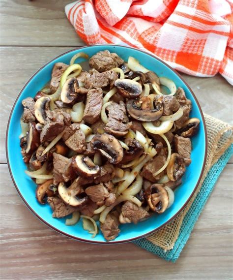 kentucky-bourbon-steak-bites-with-mushrooms-and-onions image