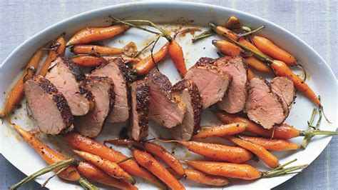spice-rubbed-pork-tenderloin-with-roasted-baby-carrots image