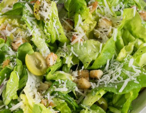 butter-lettuce-salad-with-croutons-olives image