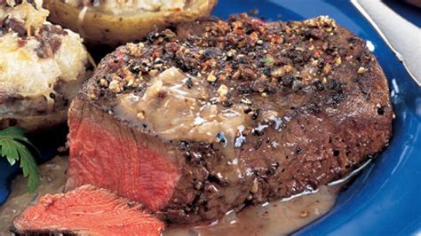 peppercorn-steaks-with-bourbon-sauce-recipe-bon-apptit image