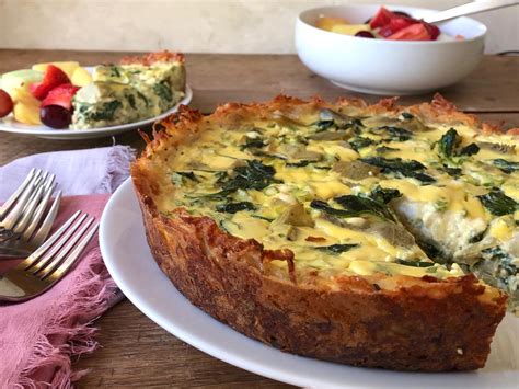 spinach-artichoke-quiche-with-cheesy-hash-brown-crust image