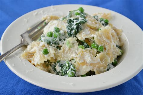 bowties-with-kale-peas-and-creamy-ricotta-sauce image