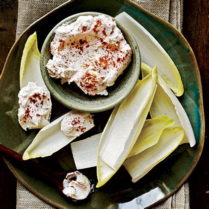 endive-spears-with-spicy-goat-cheese-recipe-myrecipes image