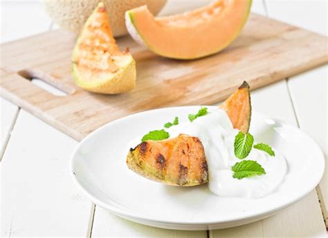 grilled-cantaloupe-with-yogurt-and-mint-the image