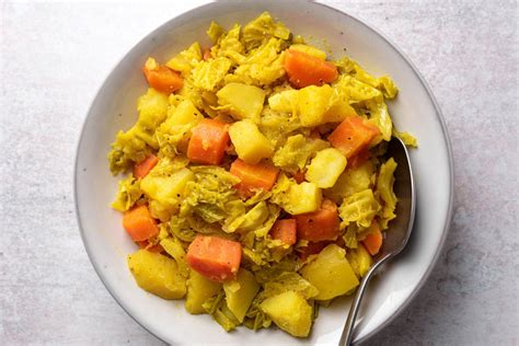 spicy-potatoes-cabbage-and-carrots-recipe-the-spruce image