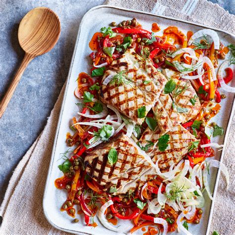 grilled-fish-with-peperonata-eatingwell image