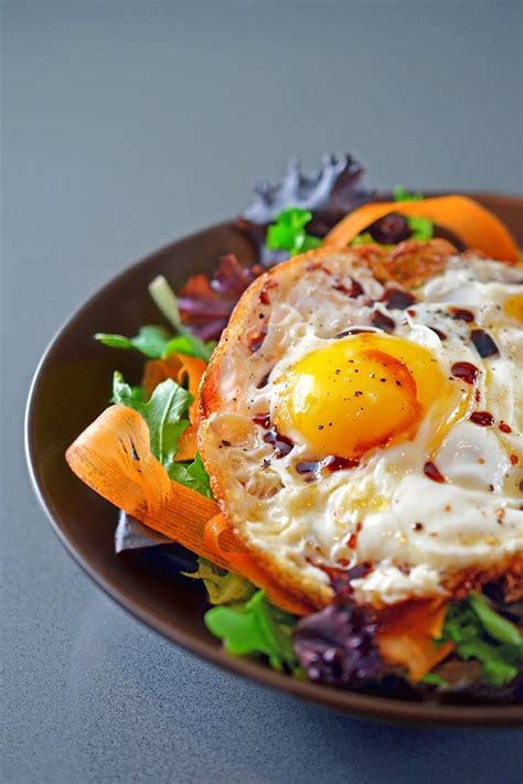 sunnyside-salad-crispy-fried-eggs-on-greens-nom image