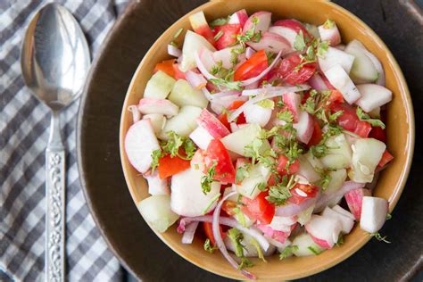 cucumber-red-radish-tomatoes-onion-salad image
