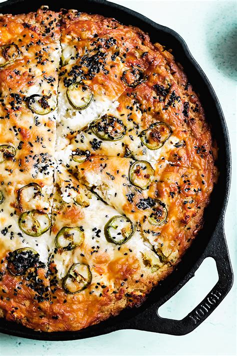 skillet-cornbread-with-cheddar-feta-and-jalapeno image