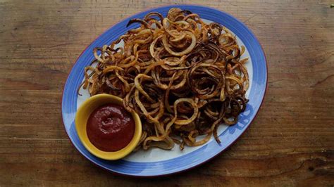 spicy-baked-curly-fries-recipe-rachael-ray-show image
