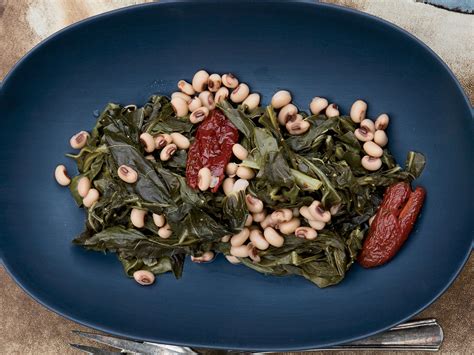collard-greens-with-black-eyed-peas-recipe-food-wine image
