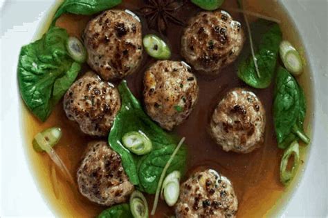 pork-and-shrimp-meatballs-with-baby-spinach-in-broth image