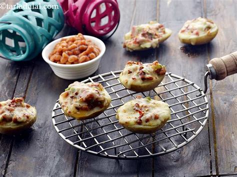 baked-jacket-potatoes-with-baked-beans-and-cheese image
