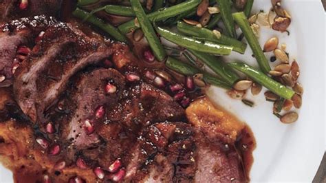 roast-duck-breasts-with-pomegranate-chile-sauce image