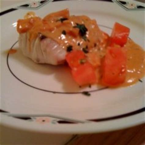 striped-bass-rockfish-with-tomato-basil-cream-sauce image