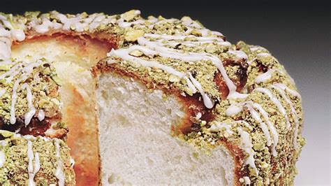 lime-angel-food-cake-with-lime-glaze-and-pistachios image