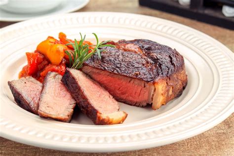 butter-basted-rib-eye-steak-recipe-the-spruce-eats image