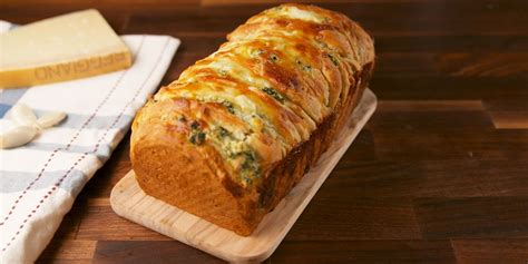 best-spinach-artichoke-pull-apart-bread-recipe-delish image