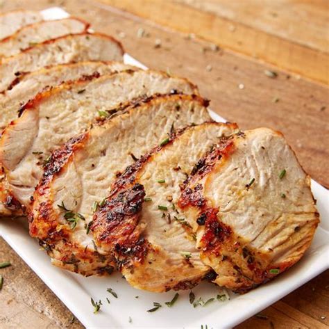 best-air-fryer-turkey-breast-recipe-with-garlic-herb-delish image