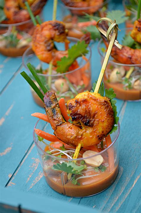shrimp-satay-skewer-shooters-with-thai-spicy-peanut-sauce image