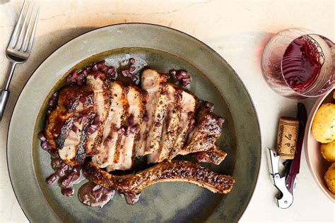 pork-chop-au-poivre-with-red-wineshallot-sauce image
