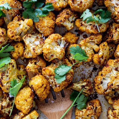 easy-curry-roasted-cauliflower-simply-delicious image