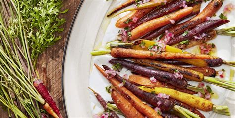 how-to-make-coriander-roasted-carrots-country-living image