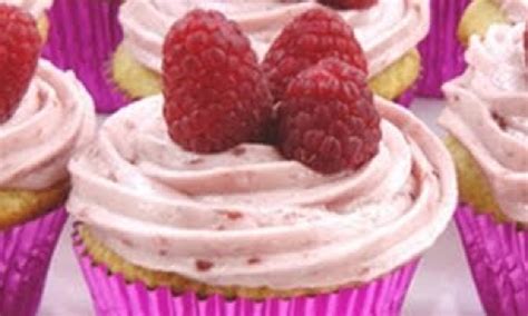 vanilla-cupcakes-with-raspberry-butter-cream-frosting image