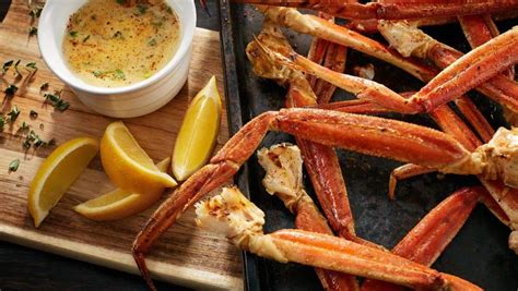 grilled-snow-crab-legs-with-garlic-butter-dipping-sauce image