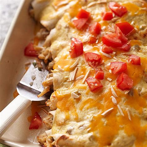 creamy-chicken-enchiladas-with-spinach-better-homes image