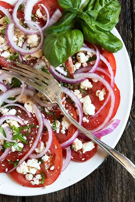 classic-tomato-feta-salad-seasons-and-suppers image