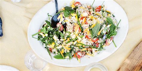 fresh-corn-tomato-herb-and-israeli-couscous-salad image