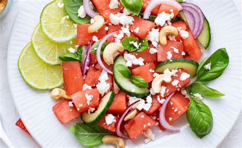 watermelon-salad-with-feta-and-tomato-cookthink image