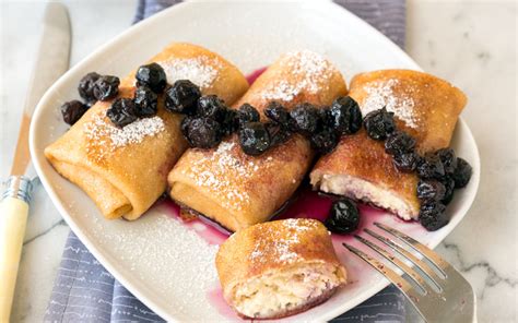 cream-cheese-blintzes-with-blueberry-drizzle-vegan image